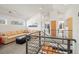 Upstairs living room with comfortable seating and an open floor plan at 536 S Vine St, Denver, CO 80209