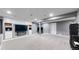 Finished basement area with plush carpeting, neutral walls, and an electric fireplace at 10181 E 112Th Way, Commerce City, CO 80640