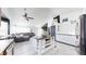 Open-concept space showcasing a kitchen island, living area, and modern finishes at 10181 E 112Th Way, Commerce City, CO 80640