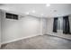 Finished basement boasts recessed lighting, neutral paint, and plush carpeting at 11022 Trailrider Pass, Littleton, CO 80127