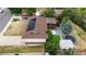 Aerial view of backyard featuring a back porch, landscaping, trampoline and above ground pool at 1261 Eagle St, Aurora, CO 80011