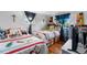 Bright bedroom featuring two twin beds, hardwood floors and lots of character at 1261 Eagle St, Aurora, CO 80011