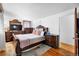 Spacious bedroom features a well-crafted wood dresser, a soft rug and lots of natural light at 1261 Eagle St, Aurora, CO 80011