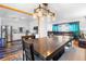 Open floor plan with dining area adjacent to the modern kitchen and cozy living room at 1261 Eagle St, Aurora, CO 80011