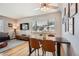 Bright dining area with wood floors and modern table at 7505 Robinson Way, Arvada, CO 80003