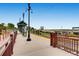 View of a light rail station with train tracks and platforms at 7505 Robinson Way, Arvada, CO 80003