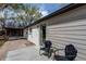 Charming patio area perfect for outdoor seating, with two chairs at 6220 W 11Th Pl, Lakewood, CO 80214