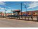View of the neighborhood's modern public transportation station with colorful art at 6220 W 11Th Pl, Lakewood, CO 80214