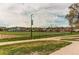 View of the neighborhood's public park and baseball field at 6220 W 11Th Pl, Lakewood, CO 80214
