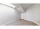 Bedroom featuring carpet floors, vaulted ceilings, and a skylight window at 12327 E Tennessee Dr # 107, Aurora, CO 80012