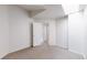 Bright bedroom features neutral carpet and closet access at 12327 E Tennessee Dr # 107, Aurora, CO 80012