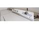 Close up on the front control panel of a white washing machine at 12327 E Tennessee Dr # 107, Aurora, CO 80012