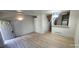 Bright living room featuring stylish flooring, ample natural light, and open layout for modern living at 12327 E Tennessee Dr # 107, Aurora, CO 80012