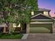 Charming two-story home with a well-maintained lawn and attached two-car garage at 11082 Fillmore Way, Northglenn, CO 80233