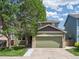 Charming two-story home with a well-maintained lawn and attached two-car garage at 11082 Fillmore Way, Northglenn, CO 80233
