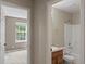 Hallway featuring the bathroom and a view into a bedroom at 11082 Fillmore Way, Northglenn, CO 80233