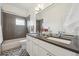 Stylish bathroom with double sinks, modern fixtures, and mosaic tile flooring at 1016 31St St, Denver, CO 80205