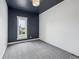 Simple bedroom with modern paint, white trim, and plush carpet at 1016 31St St, Denver, CO 80205
