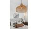 Closeup of the bedroom showcasing a stylish light fixture and comfortable bed at 1016 31St St, Denver, CO 80205