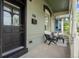 Inviting front porch with seating area, perfect for enjoying the outdoors at 1016 31St St, Denver, CO 80205