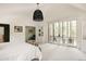 Main bedroom with access to a balcony through sliding doors for outdoor enjoyment at 301 Fairfax St, Denver, CO 80220