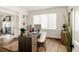 Bright and organized office with built-in shelves and a large window at 301 Fairfax St, Denver, CO 80220