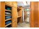Custom closet with built-in shelving and drawers, offering ample storage and organization, enhancing functionality at 4515 Red Rock Dr, Larkspur, CO 80118
