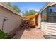 Outdoor patio featuring brick pavers, a retractable awning, and a cozy seating area at 8040 E Dartmouth Ave # 16, Denver, CO 80231