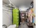 This walk-in closet includes clothing racks, shelves and organizer drawers at 8040 E Dartmouth Ave # 16, Denver, CO 80231