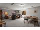 Spacious living room featuring a fireplace, large window, and comfortable seating arrangement at 8040 E Dartmouth Ave # 16, Denver, CO 80231
