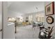 Bright and airy living room with neutral color palette and abundant natural light from large windows at 8040 E Dartmouth Ave # 16, Denver, CO 80231