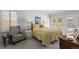 Comfortable bedroom with large windows, ample natural light and ensuite bath at 8040 E Dartmouth Ave # 16, Denver, CO 80231