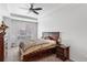 Bedroom with a ceiling fan, window, and carpeted floor; comfortable and stylish at 23743 E Ida Pl # E, Aurora, CO 80016