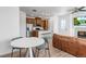 Open-concept living space with a kitchen, dining area, living room, and modern finishes at 23743 E Ida Pl # E, Aurora, CO 80016