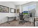 Bright home office with large windows and neutral carpet at 23743 E Ida Pl # E, Aurora, CO 80016