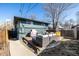 Outdoor space features modern patio furniture, a hot tub and a grill at 3233 Meade St, Denver, CO 80211