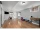 Finished basement featuring laminate floors and versatile space for recreation or fitness at 3233 Meade St, Denver, CO 80211