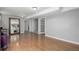 Spacious finished basement with laminate flooring, ample storage, and open layout at 3233 Meade St, Denver, CO 80211