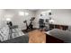 Bedroom with hardwood floors; designed as an exercise room, features natural lighting at 3233 Meade St, Denver, CO 80211
