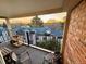 Relaxing balcony with comfortable seating offers stunning views of the surrounding neighborhood at 15911 E Dakota Pl # 301, Aurora, CO 80017