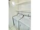 Practical laundry room equipped with a washer and dryer for added convenience at 15911 E Dakota Pl # 301, Aurora, CO 80017