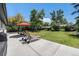 Spacious backyard with lush lawn and patio furniture at 6538 S Lee Ct, Centennial, CO 80121