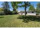 Backyard featuring lush green lawn and a shade tree at 6538 S Lee Ct, Centennial, CO 80121