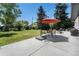 Backyard featuring patio with seating and an umbrella at 6538 S Lee Ct, Centennial, CO 80121