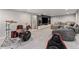 Finished basement with cozy seating, entertainment setup, and drum set at 6538 S Lee Ct, Centennial, CO 80121
