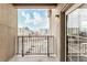 Private balcony with city views and metal railing at 475 W 12Th Ave # 6B, Denver, CO 80204