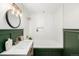 Updated bathroom with soaking tub and stylish vanity at 475 W 12Th Ave # 6B, Denver, CO 80204