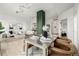 Contemporary dining area with metal table and leather chairs at 475 W 12Th Ave # 6B, Denver, CO 80204