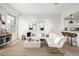 Modern living room with open concept kitchen and city views at 475 W 12Th Ave # 6B, Denver, CO 80204