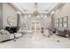Elegant lobby with chandelier, seating area, and fireplace at 475 W 12Th Ave # 6B, Denver, CO 80204